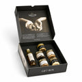 Coffret cadeau Desirée premium à la truffe ouvert, comprenant huile d’olive à la truffe blanche, sauce à la truffe d’été, beurre à la truffe et trois crèmes salées