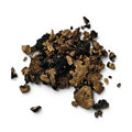 Fresh Tuber melanosporum Black Winter Truffle pieces with naturally exposed marbled interiors