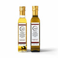 Deux bouteilles de 250 ml d'huile d'olive aromatisée à la truffe noire et blanche Terra Ross