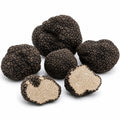 Truffes entières et coupées fraîches Tuber aestivum Grade A avec intérieur noisette pâle et marbrures fines