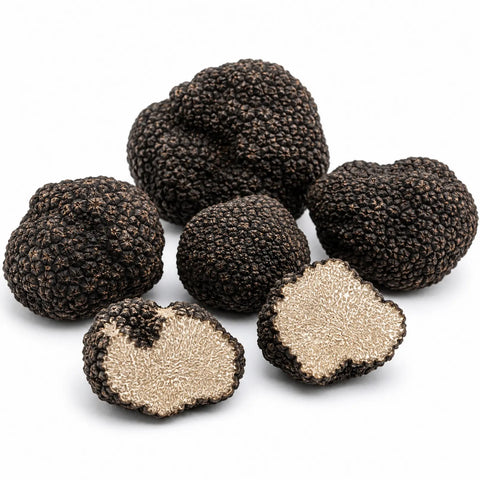 Truffes entières et coupées fraîches Tuber aestivum Grade A avec intérieur noisette pâle et marbrures fines