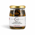 Bocal en verre contenant des tranches de carpaccio de truffes d'été Tuber aestivum à l'huile d'olive