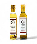 Deux bouteilles d'huile d'olive aromatisée à la truffe noire et blanche Terra Ross