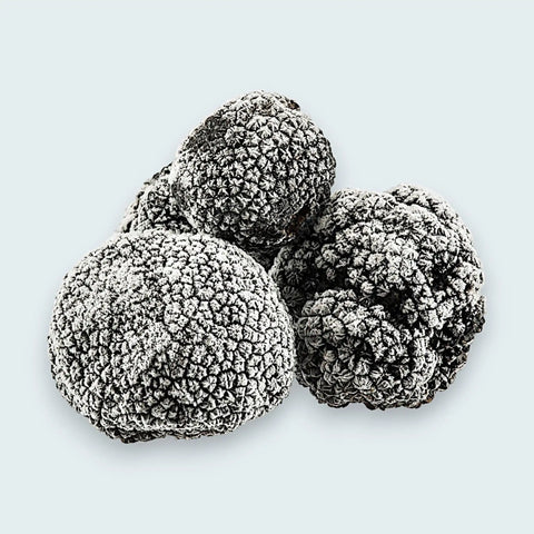 Textured black truffles.