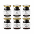 Six pots de 300 g de truffes d'été entières Tuber aestivum conservées en saumure